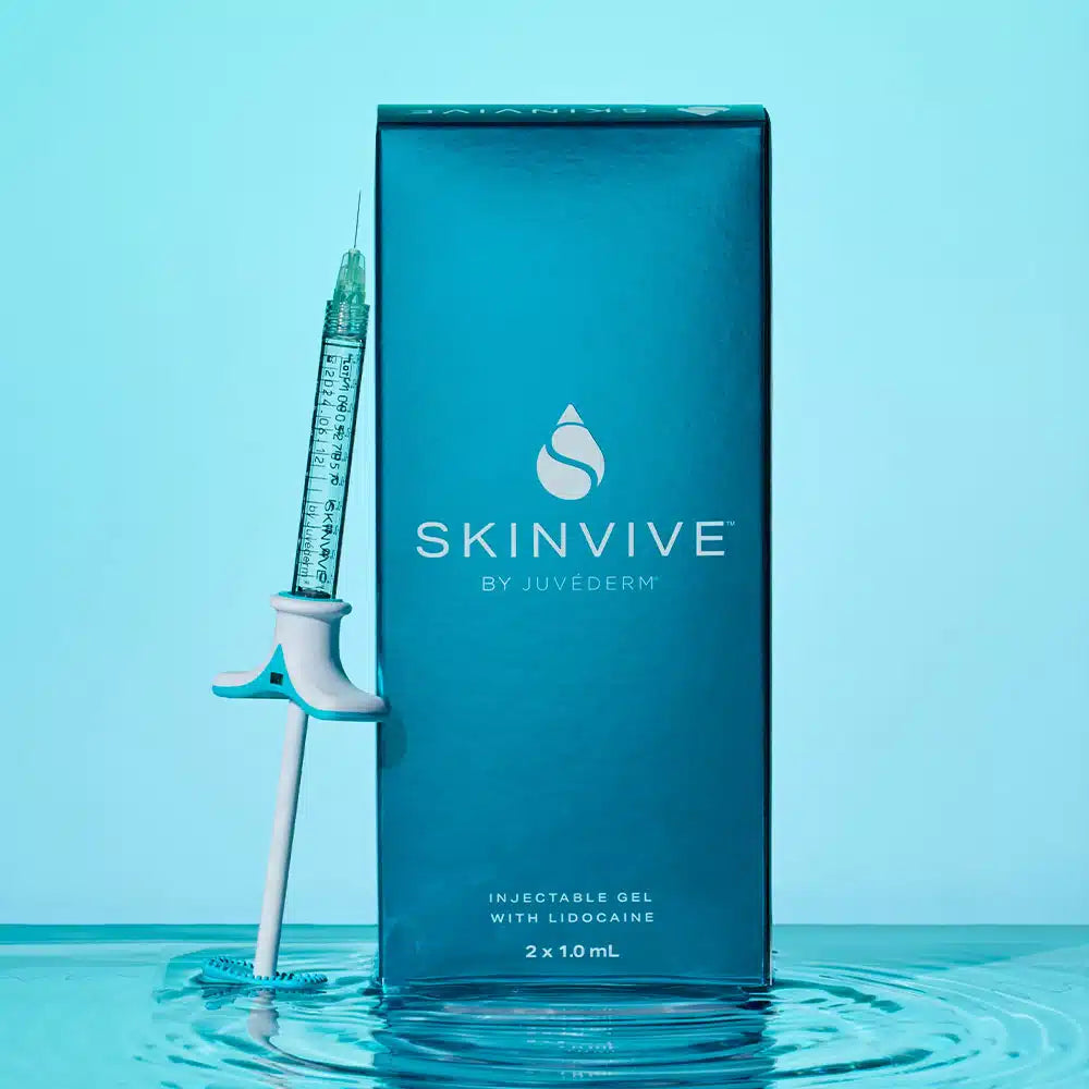 Skinvive anti-aging skin booster injectable gel with lidocaine in blue packaging with syringe on water surface