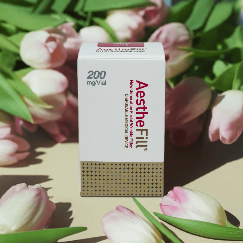 Aesthefill 200mg product box by Nutrination surrounded by tulips for facial rejuvenation.