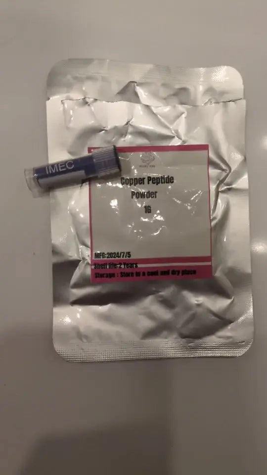 Nutrination GHK-CU Copper Peptide powder sachet with vial on a white background, ideal for skin care enhancements.