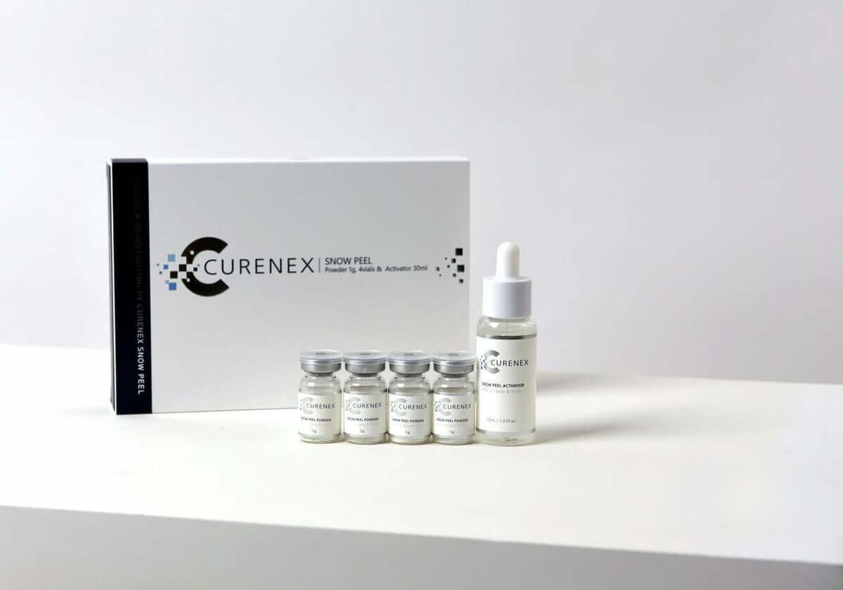 CURENEX SNOW PEEL kit with 4 vials and dropper for silky skin, featuring gentle exfoliation and Nutrination benefits.