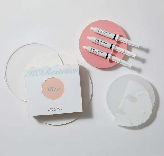 Riox Co2 Mask kit featuring face masks, activating syringes, and treatment trays for enhanced skin nutrination.