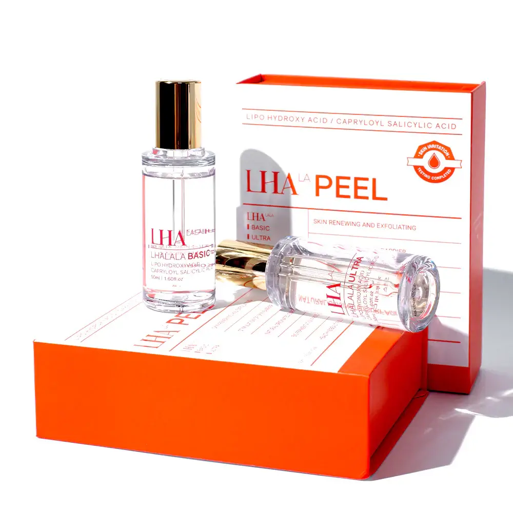 LHALA PEEL Set featuring resurfacing serums in a vibrant orange box for clear, radiant skin and pigmentation treatment.