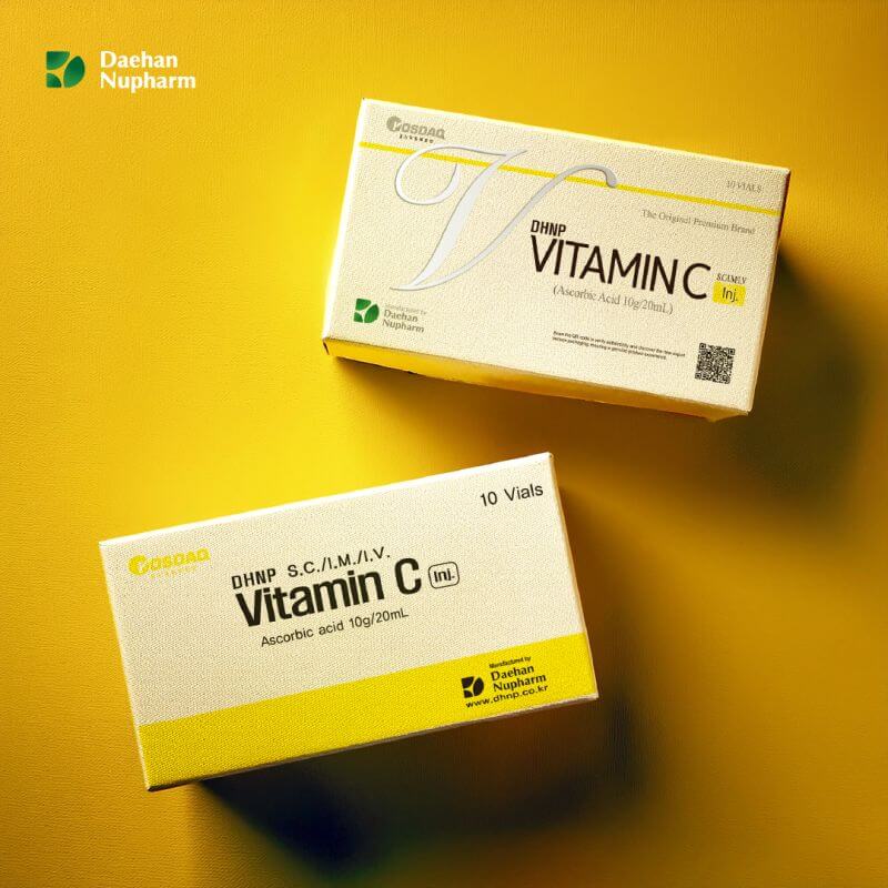 DHNP Vitamin C vials packaging by Nutrination on a yellow background, showcasing antioxidant benefits and skincare support.