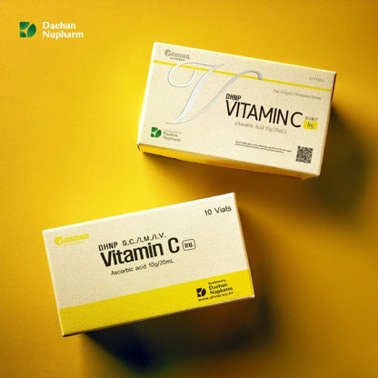 DHNP Vitamin C vials packaging by Nutrination on a yellow background, showcasing antioxidant benefits and skincare support.